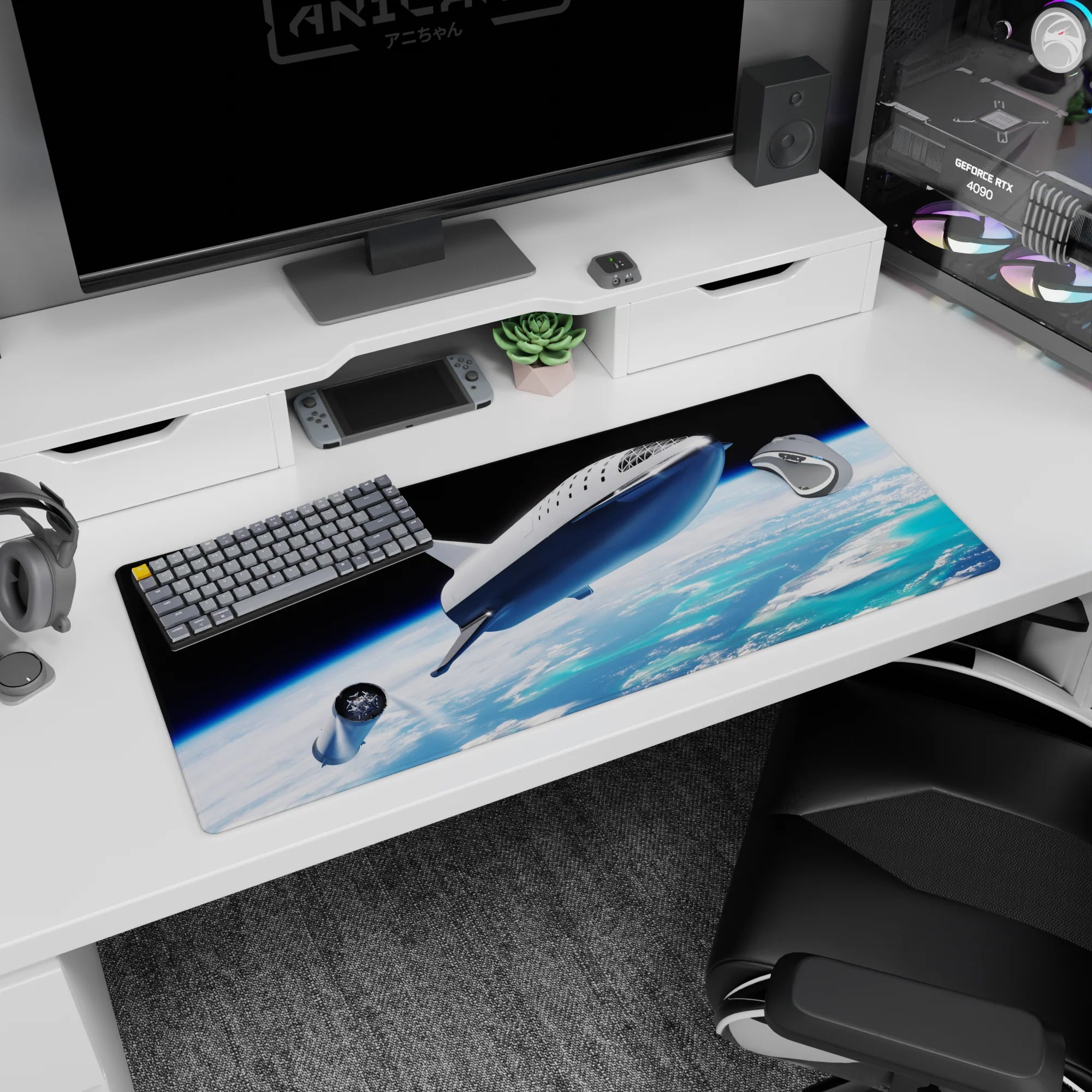 Silver spaceship cruising above clouds and bright ocean blues on a 36x16 inches desk pad.
