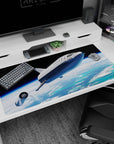 Silver spaceship cruising over clouds and blue ocean on a 40x20 inches desk pad under deep black sky.