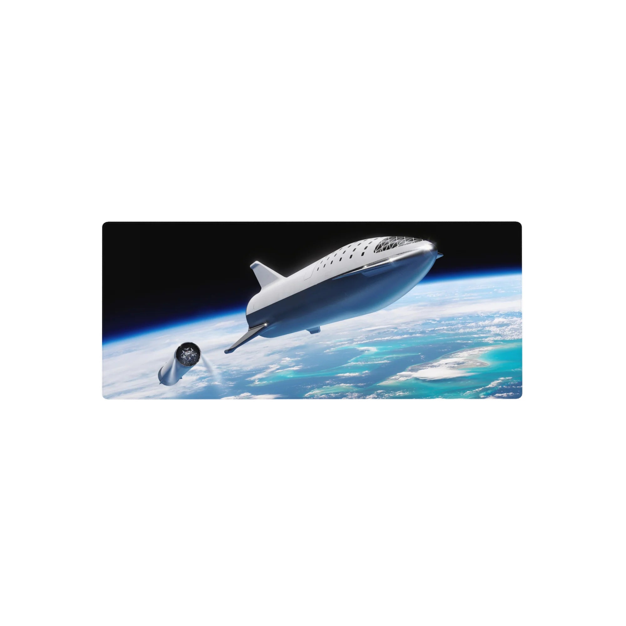 Space-themed 28x12 inches mouse pad with silver spaceship above clouds and ocean horizon on black sky.