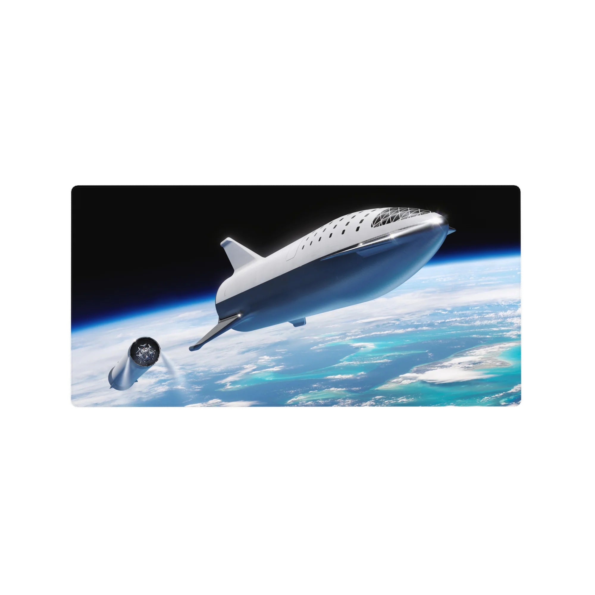 Space-vibes desk mouse pad 32x16 inches with silver spaceship over clouds and ocean horizon.