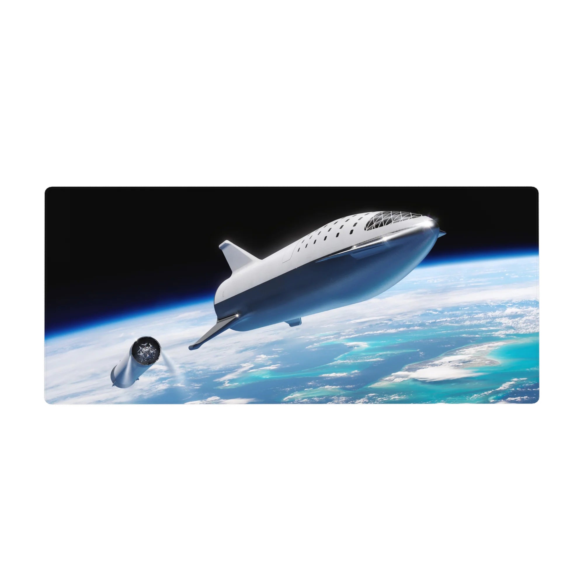 Space-themed desk pad 36x16 inches with silver spaceship over cloud swirls and ocean horizon glow.