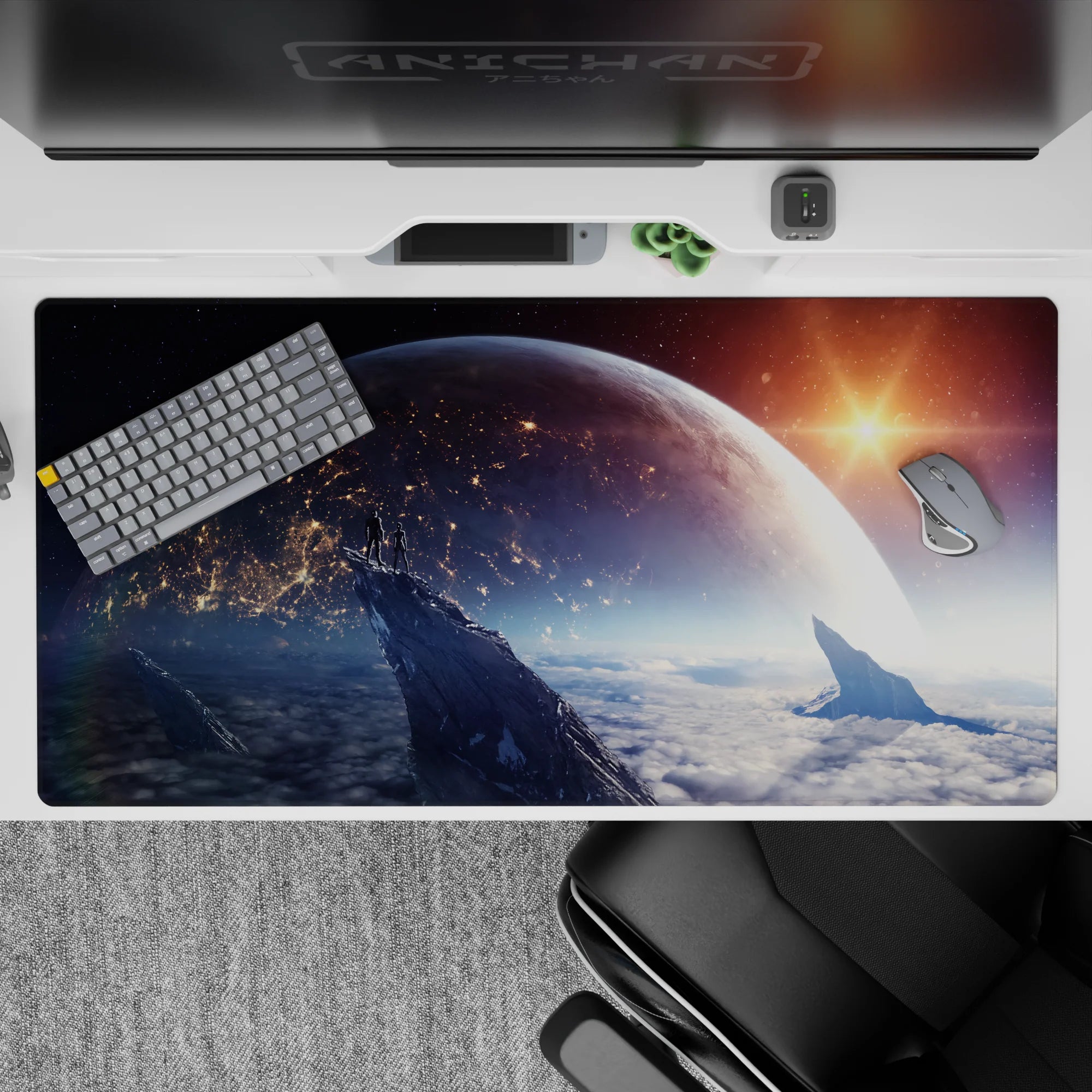 Large 40x20 inch desk pad with deep navy sky, sunrise tones, and mountain silhouettes for smooth daily use.