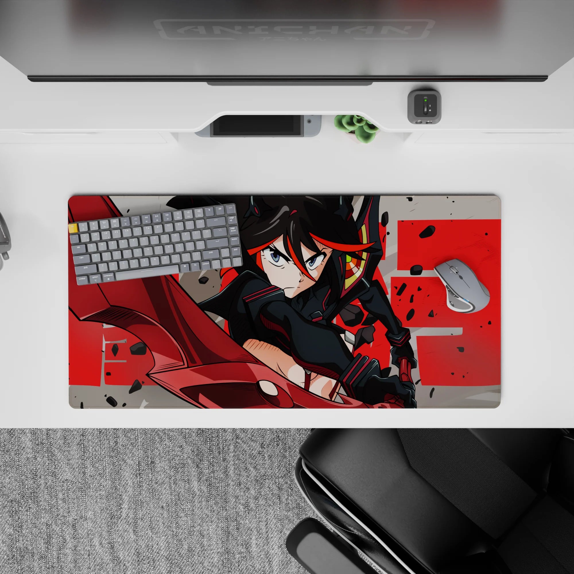 32x16 inches anime mouse pad in steel gray with crimson streaks, red typography, bold high-energy vibe.