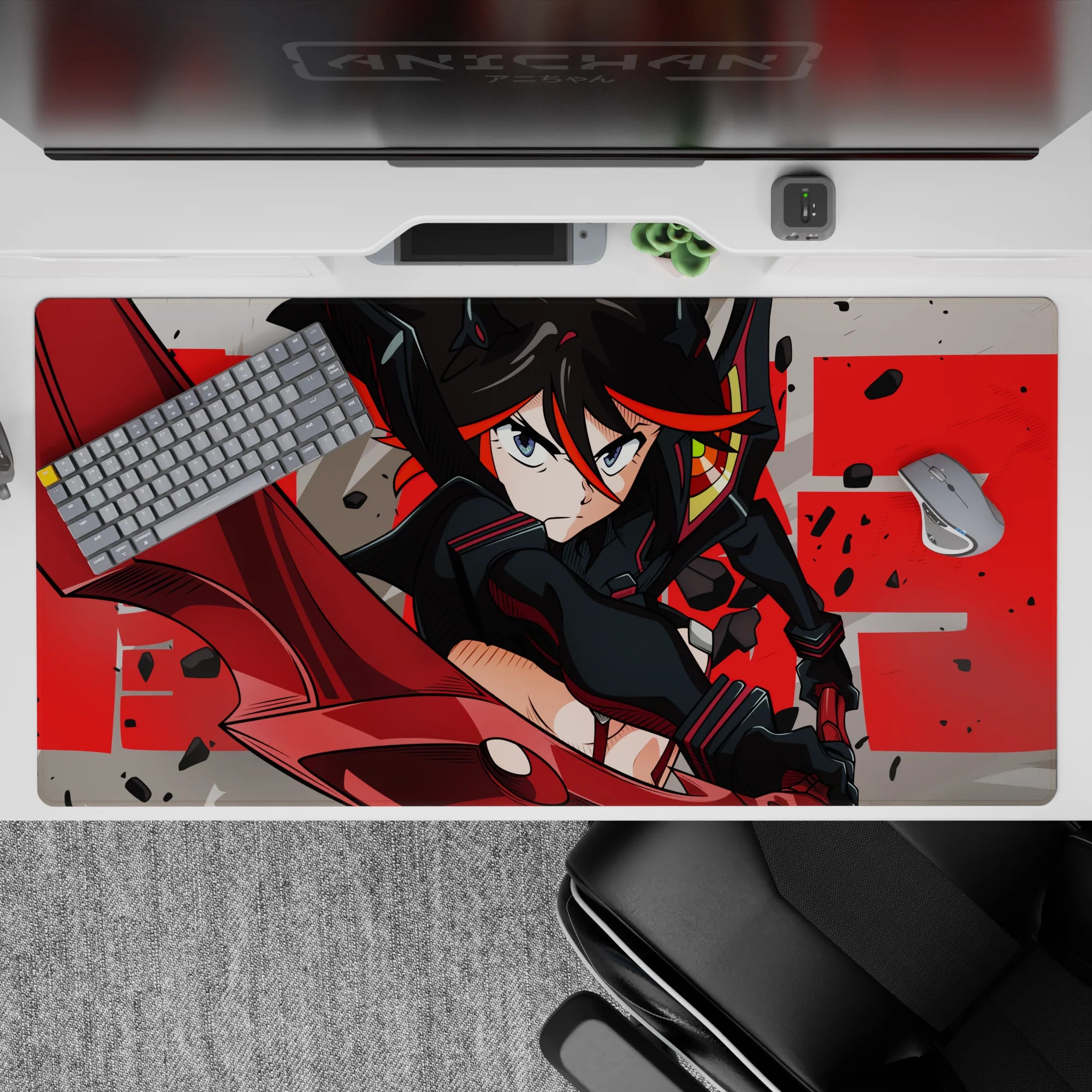 Steel gray and crimson anime girl desk pad 40x20 inches, splatter debris vibe with bold red typography.
