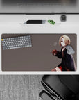 Moody lo-fi anime girl mouse pad 32x16 inches in soft gray, warm reds, and deep hoodie tones.