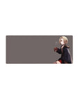 28x12 inches anime girl mouse pad with blonde bob, red eyes, dark hoodie, red plaid skirt on gray.