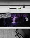 36x16 inches anime desk pad in deep blacks and lavender, dreamy dusk lighting and calming waterfall mist.