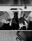 40x20 inches black and gray anime desk pad, dark dramatic cozy vibe with sharp silhouettes and soft tones.