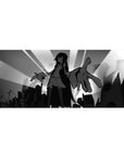 Anime girl desk pad 36x16 inches with monochrome city skyline, sunburst rays, bold silhouette art.