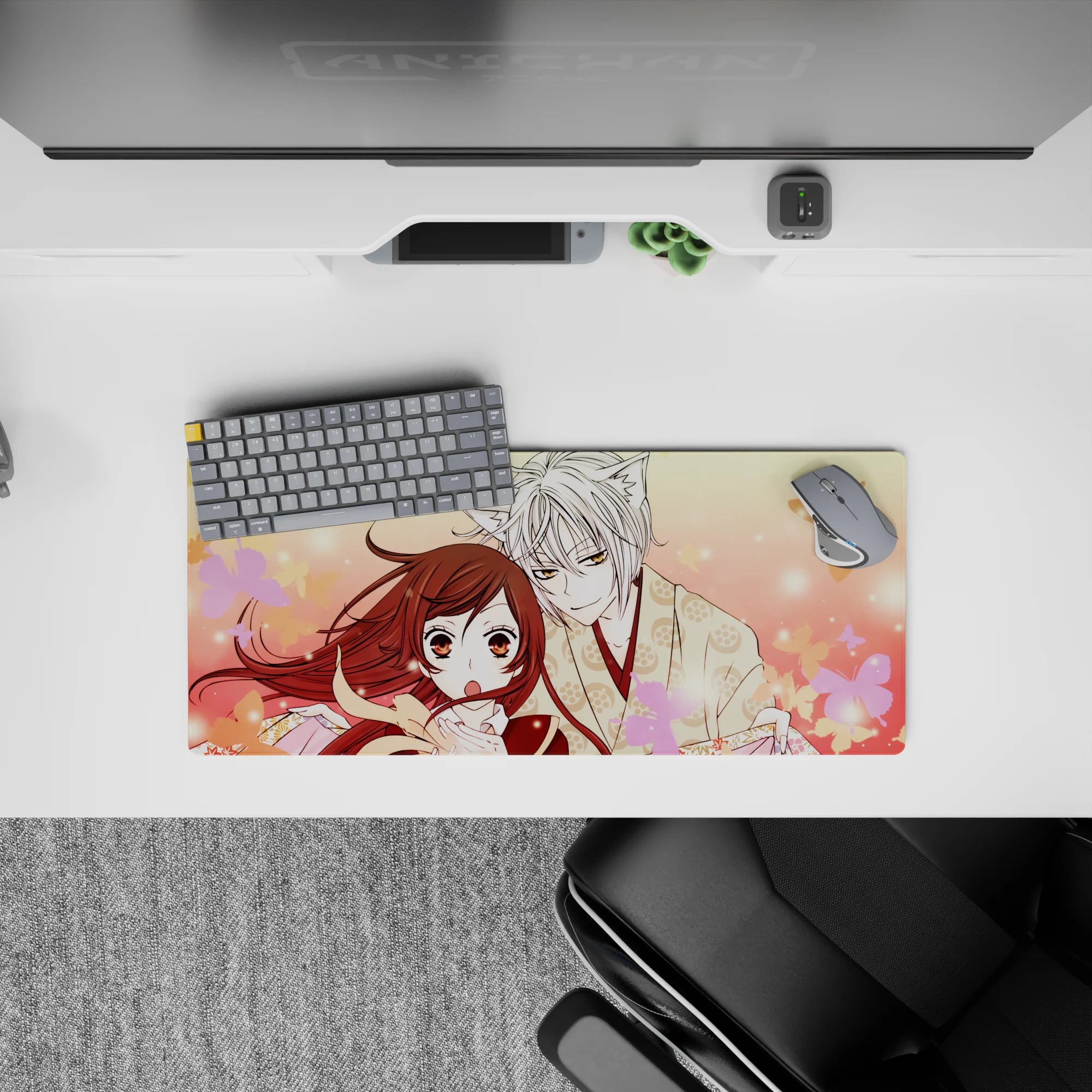 28x12 inches anime mouse pad in warm peach and blush pink, calm romantic vibe with drifting sakura.