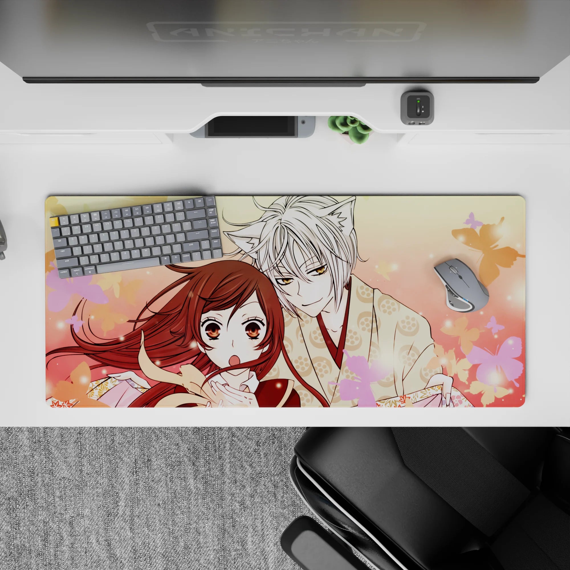 Romantic peach-pink anime desk pad 36x16 inches with soft blush gradients and floating cherry blossoms.