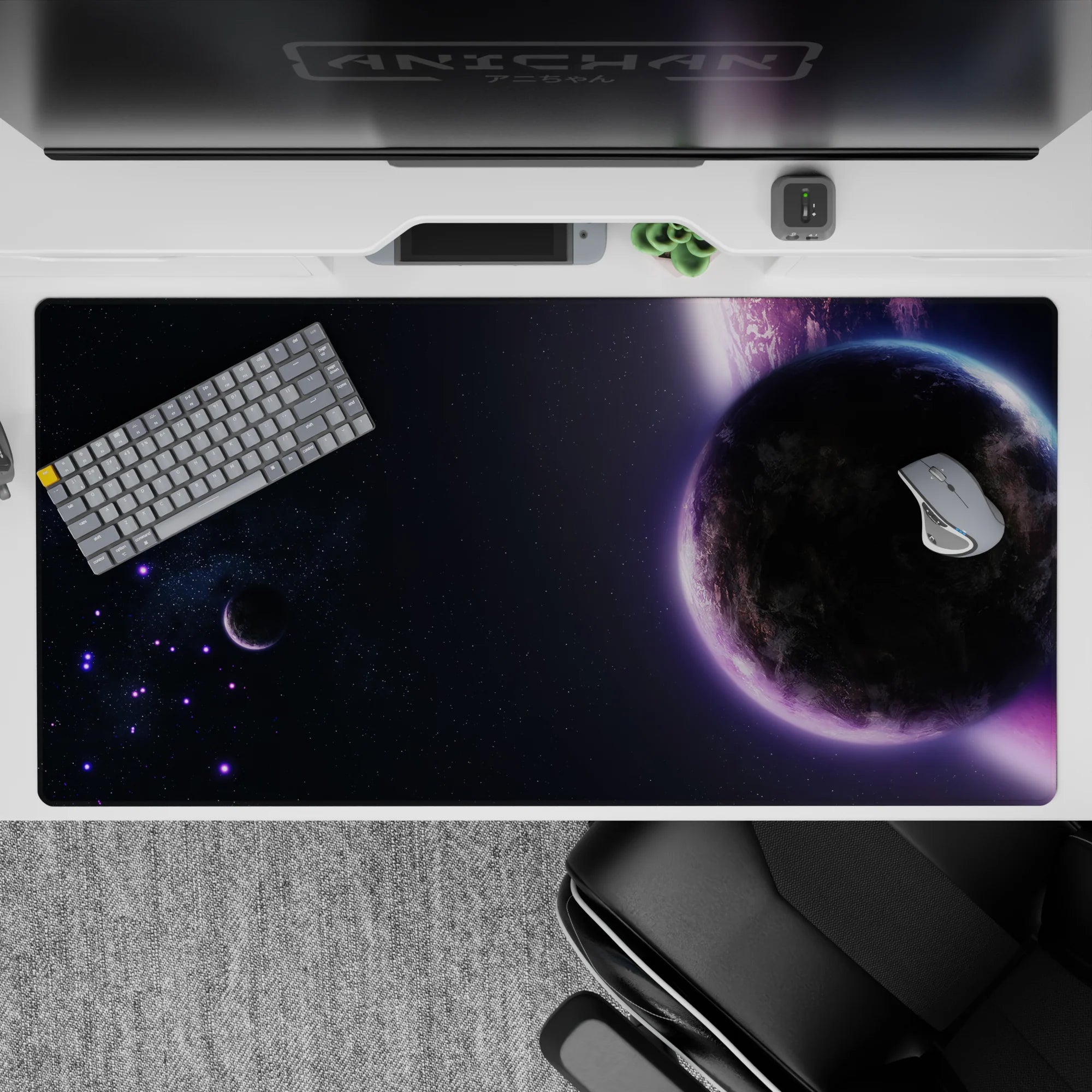 Dreamy midnight space desk pad 40x20 inches in deep blacks with soft violet glow and calming cosmic mood.