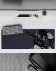 Moody monochrome anime girl mouse pad 32x12 inches in smoky gray tones with sharp ink-streak hair.