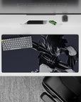Moody monochrome anime girl mouse pad 32x16 inches in smoky gray and black, glossy armor highlights.
