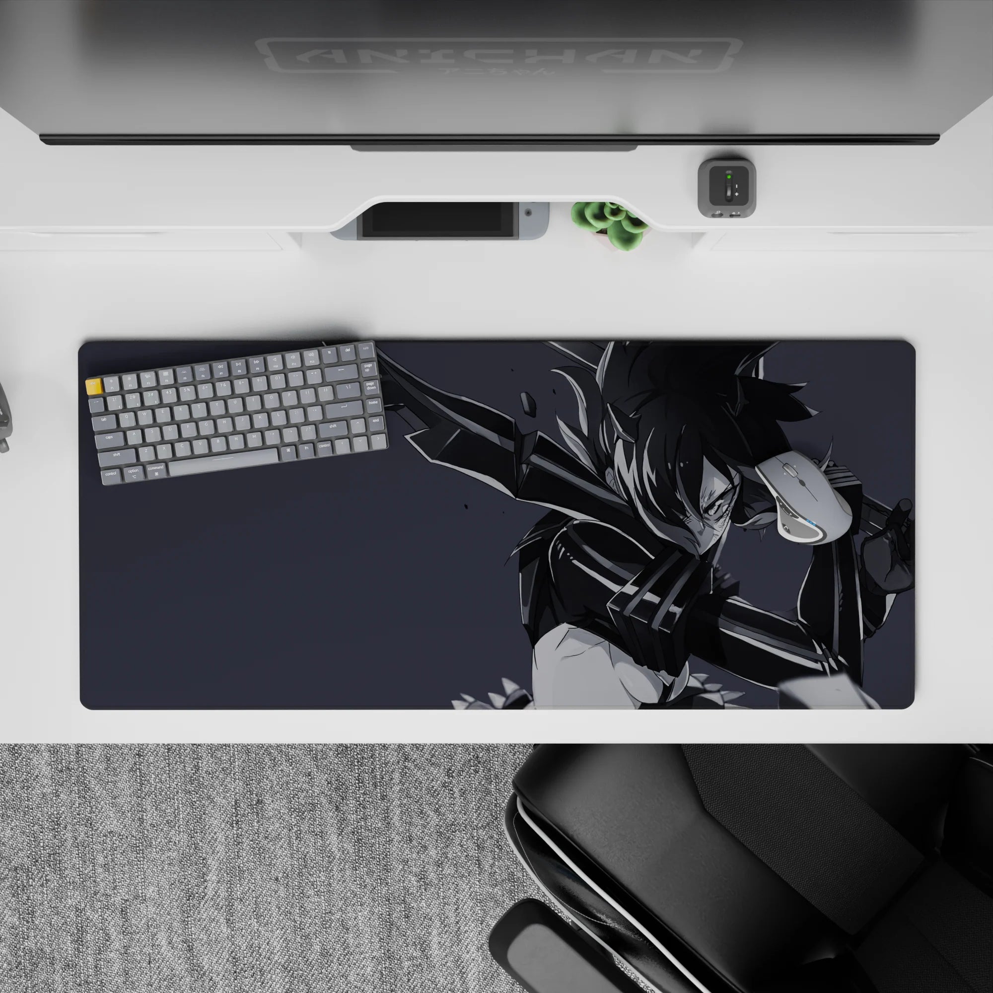 Moody monochrome anime desk pad 36x16 inches in smoky grays with sharp ink-streak hair highlights.