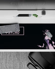 Pink and black 36x16 inches anime desk pad with moody mischievous vibe and gritty vintage ink splatter.