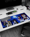 Rooftop moonlit scene anime girl desk pad 36x16 inches featuring four playful girls posing with snacks.