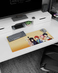 28x12 inches anime girl mouse pad featuring blonde girl with bow beside a calm beret girl and friends.