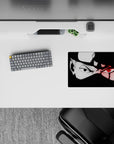 Anime mouse pad 14x10 inches in black and white with a red Sharingan glow, dark edgy mood.
