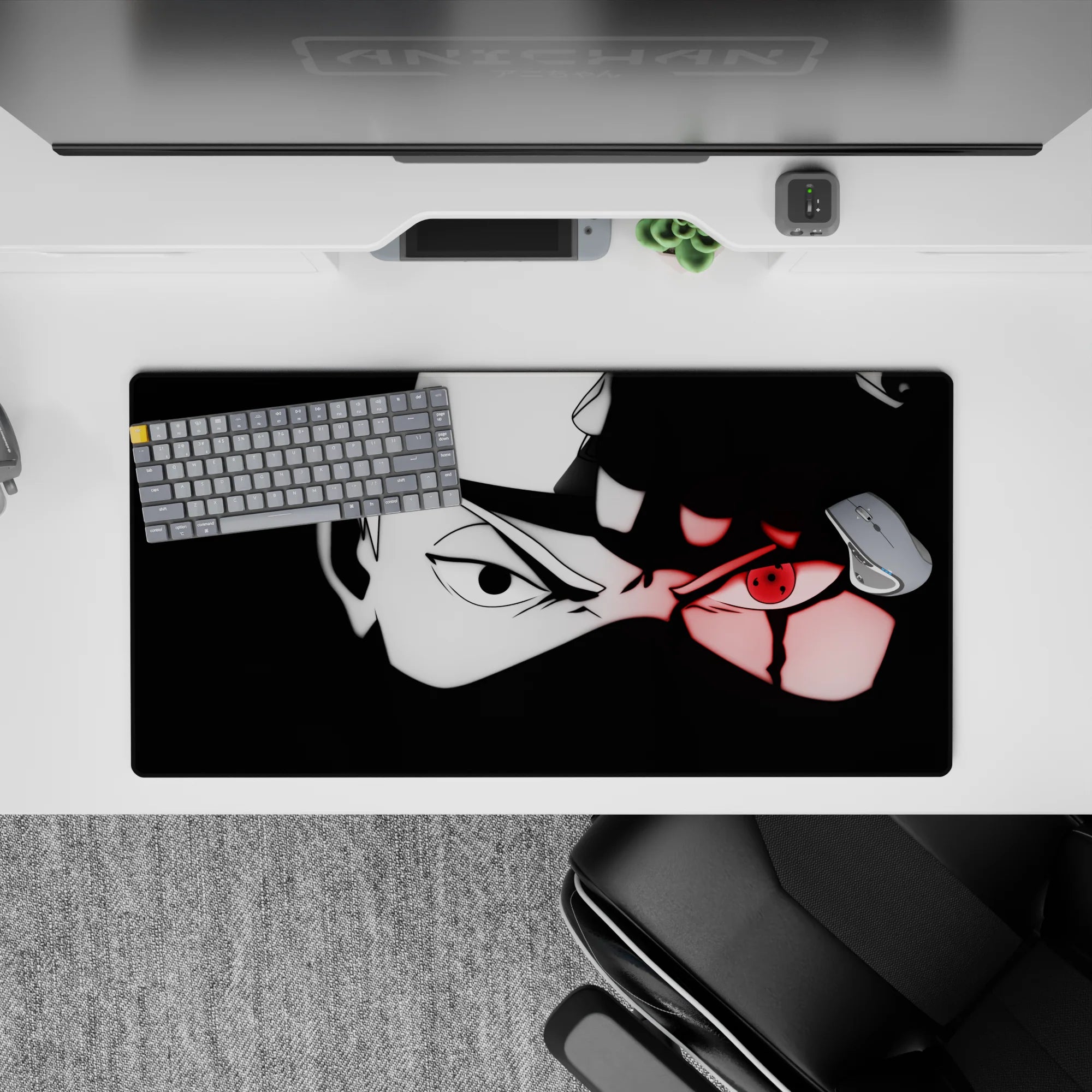32x16 inches anime mouse pad in black and white with a vivid red Sharingan glow, dark edgy vibe.