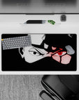 32x16 inches anime mouse pad in black and white with a vivid red Sharingan glow, dark edgy vibe.