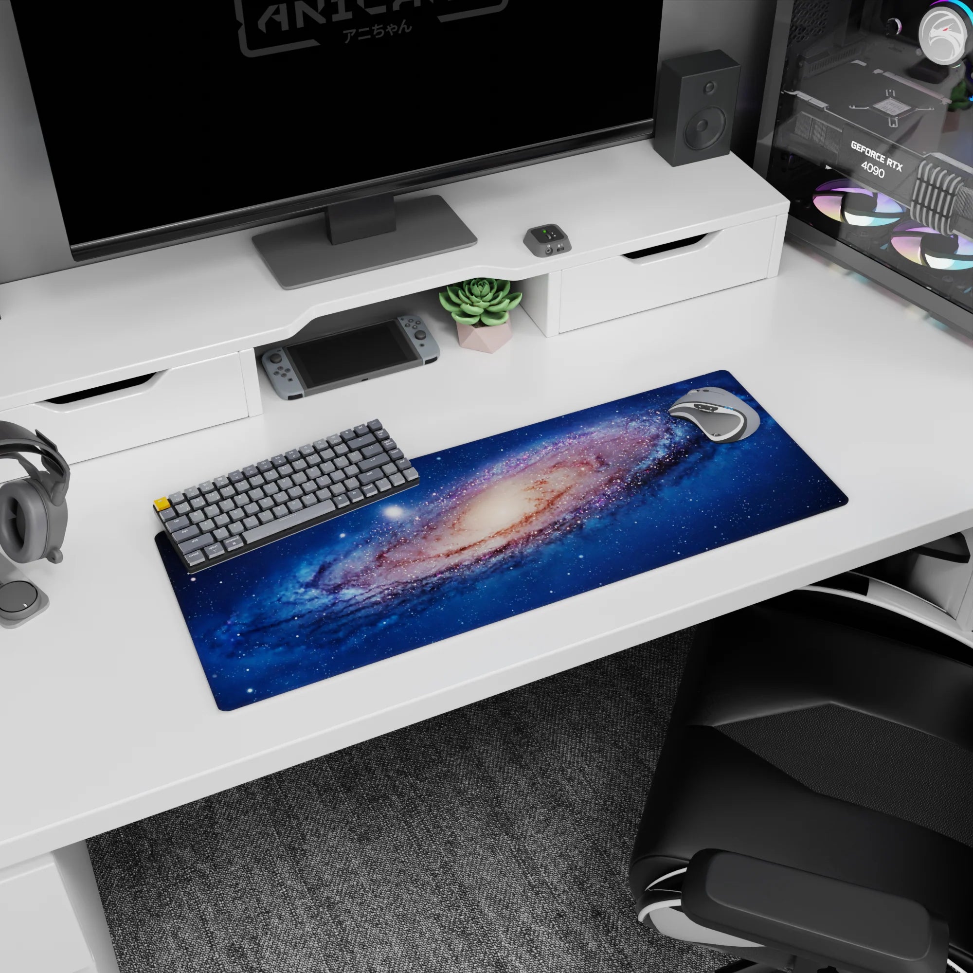 Mesmerizing space vortex scene mouse pad, 32x12 inches, featuring a swirling galaxy with scattered stars.