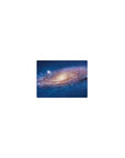 Classic 14x10 inches mouse pad with swirling galaxy spiral design and starry speckles.