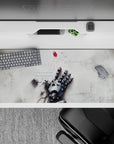 36x16 inches anime desk pad in soft gray steel and white, quiet melancholy sci-fi vibe with red accent.