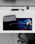 28x12 inches anime desk mat in midnight gradients and neon blues with orange ribbon accents, sleek moody feel.