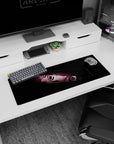Close-up scene anime girl mouse pad 32x12 inches, candy pink eyes staring as if mid-mischief in shadows.