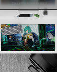 32x16 inches anime girl desk mat in mint green and electric blue, late-night Tokyo glow with reflections.