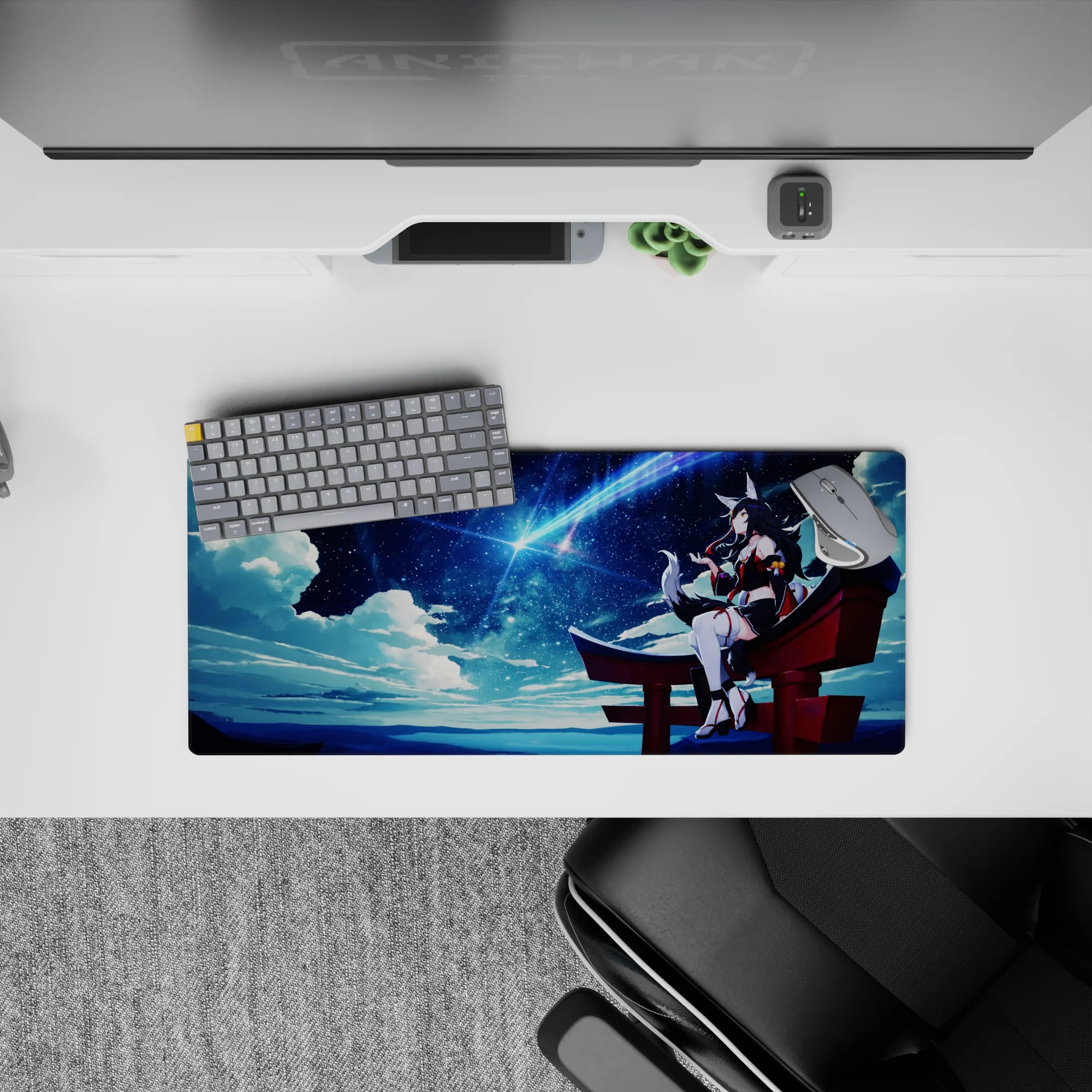 28x12 inches desk mat in deep navy with comet-blue streaks, soft clouds, and cozy midnight glow.