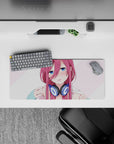 Cozy blush-tone anime mouse pad 28x12 inches in soft pink stripes with crisp art and a teasing vibe.