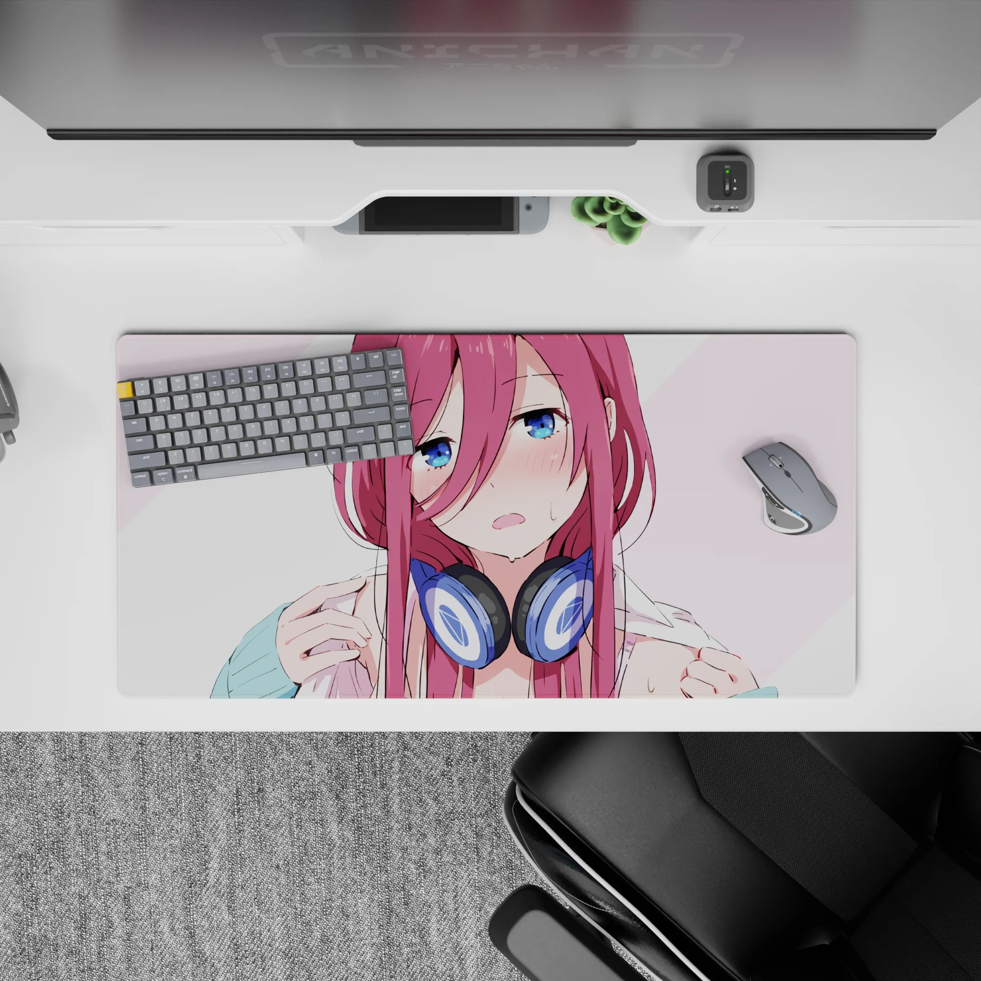 32x16 inches kawaii mouse pad in soft blush and pale pink stripes, navy headphones, cozy teasing vibe.