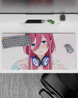 32x16 inches kawaii mouse pad in soft blush and pale pink stripes, navy headphones, cozy teasing vibe.