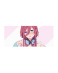 Anime girl mouse pad 28x12 inches with blue eyes, pink hair, and navy headphones on a striped background.
