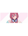 32x12 inches anime girl mouse pad with pink-haired, blue-eyed art and chunky navy headphones.