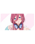 32x16 inches anime girl mouse pad with pink-haired, blue-eyed headset girl on pale pink striped background.