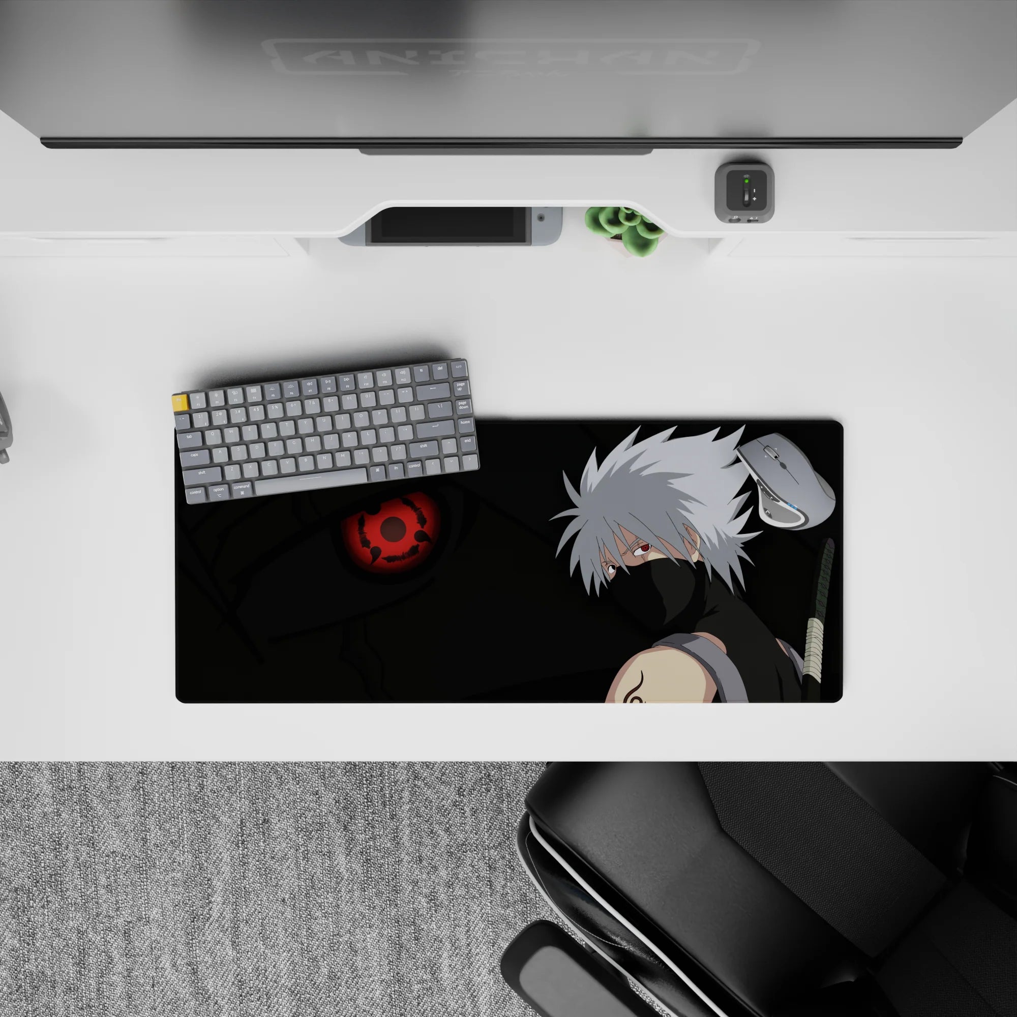 28x12 inches anime mouse pad in smoky blacks and deep greens with a red Sharingan glow, chill vibe.