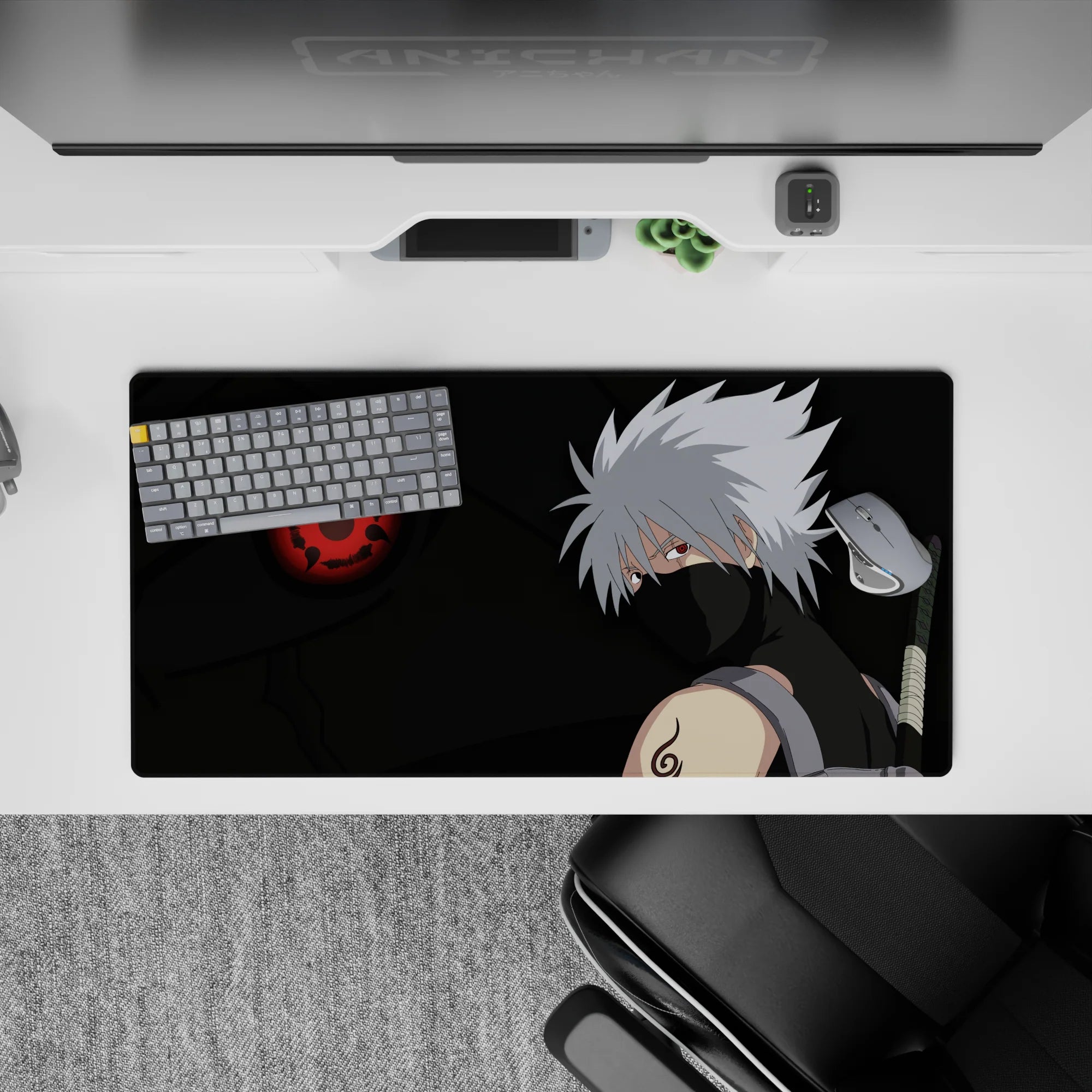 32x16 inches anime mouse pad in smoky blacks and deep greens with red Sharingan glow, chill fierce vibe.