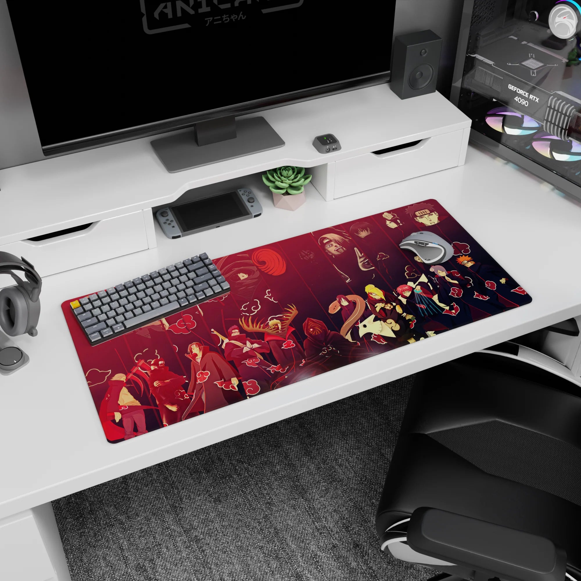 Itachi Uchiha front and center on Akatsuki anime desk pad 36x16 inches with crowd scene backdrop.