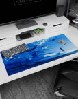 36x16 inches anime desk pad showing a lone girl on a quiet beach, gazing at a glowing horizon and sea.