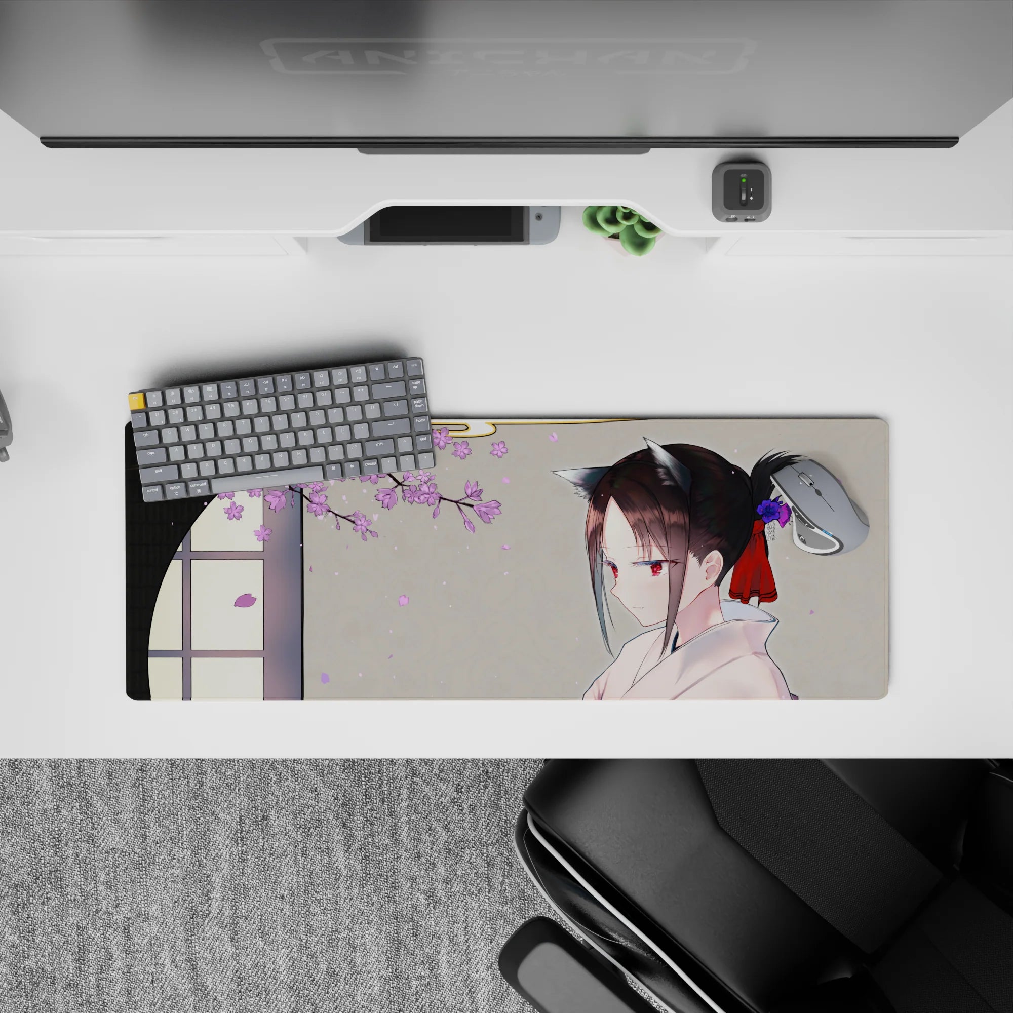 32x12 inches desk mat in soft spring tones—warm gray, lilac petals, calm cozy anime aesthetic.