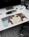 32x16 inches Hyouka Eru Chitanda mouse pad, pouty close-up with vivid green eyes on cool blue.