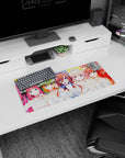 28x12 inches anime desk mouse pad featuring center bride in headphones, surrounded by four bridal friends.