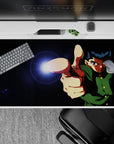 Midnight black anime desk pad 40x20 inches with electric glow, high-contrast shadows, vivid green accents.