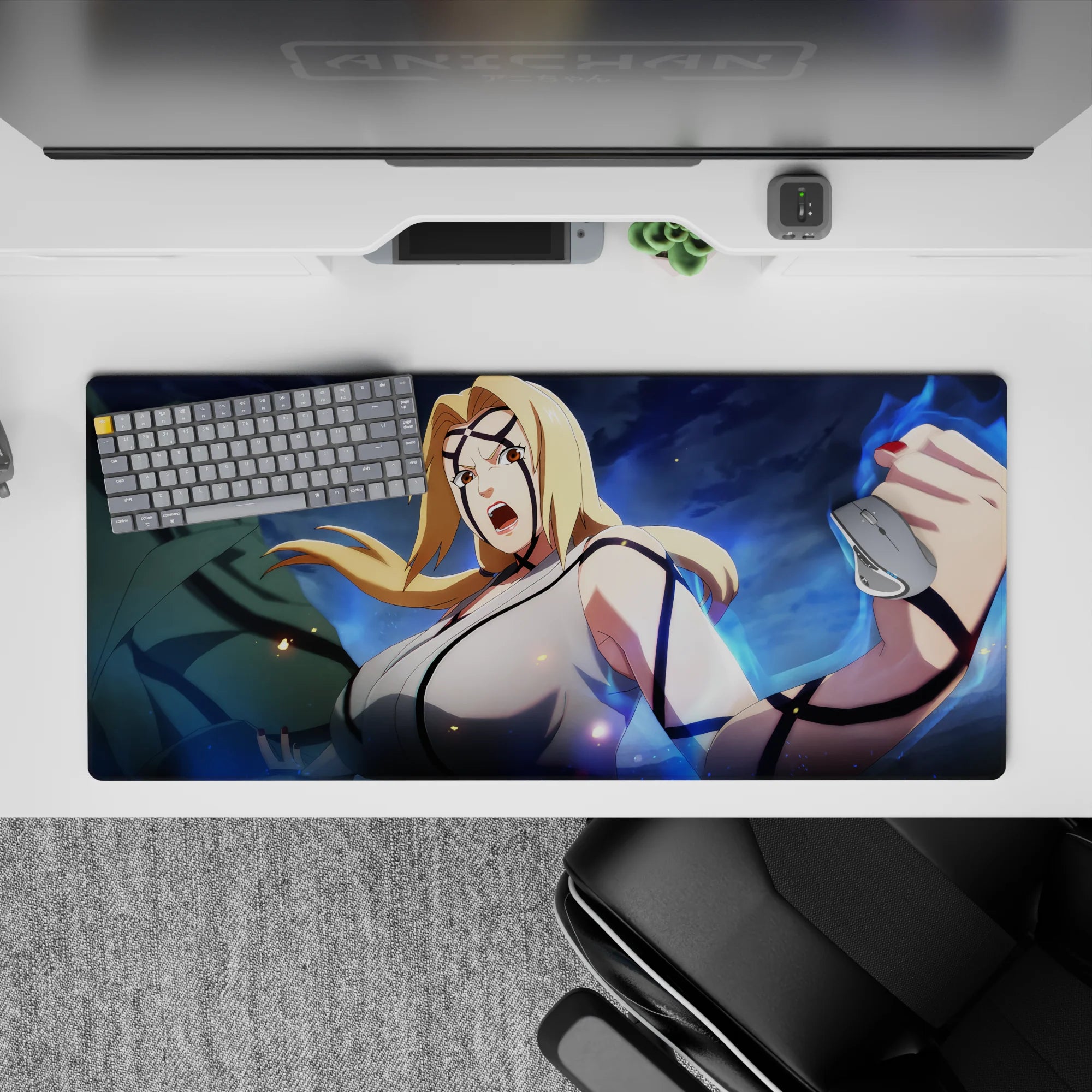 Stormy blue anime desk pad 36x16 inches with glowing sparks, high-contrast blond hair, and fierce energy.