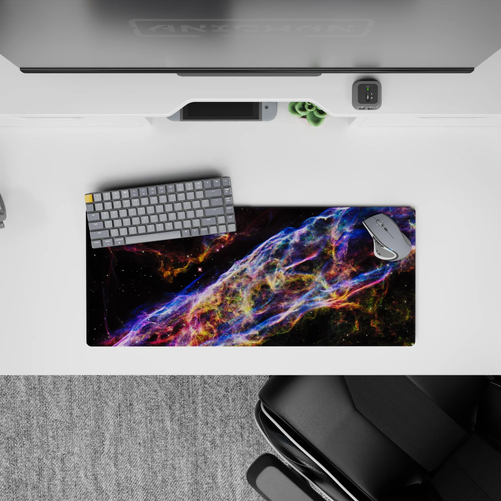 Neon blue, violet, and ember-orange star-speckled mouse pad 28x12 inches for a late-night vibe.