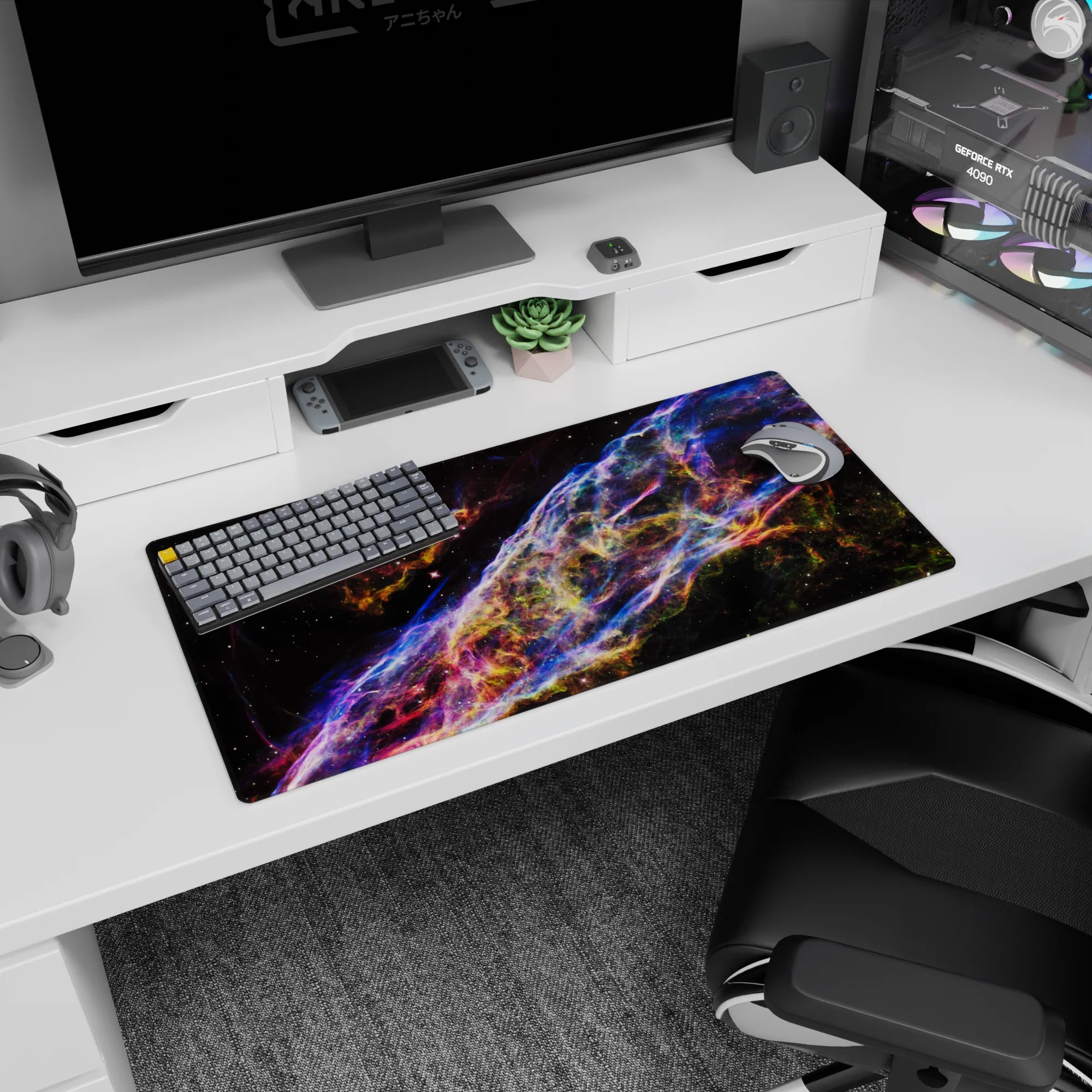 Deep space scene mouse pad 32x16 inches featuring a swirling cosmic ribbon dancing across a starry sky.