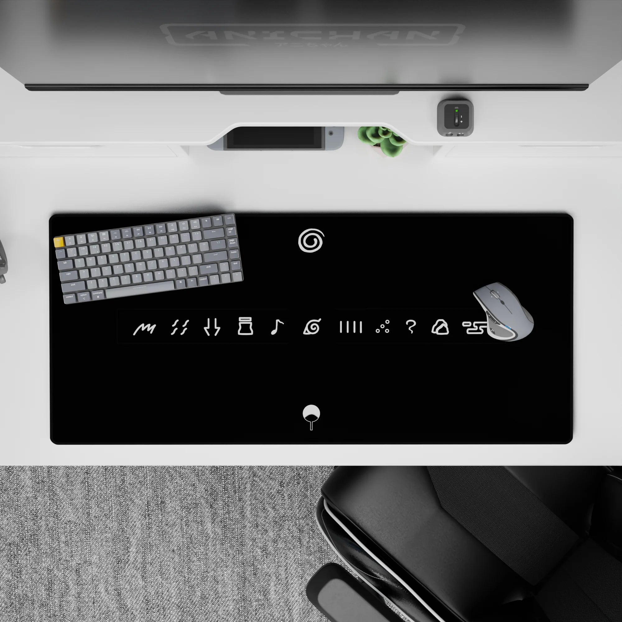 Matte black anime desk pad with bright white line art, minimalist ninja icons, 36x16 inches.